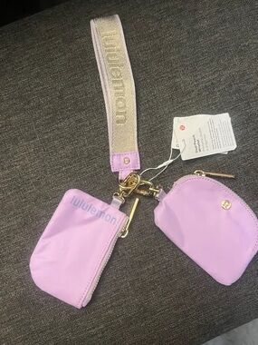 lululemon athletica Lilac Double Pouch Wristlet with Gold Strap Accent